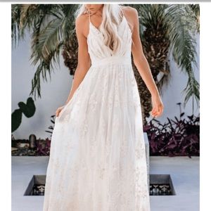 Brand new dress. Size XL. Fits size 12/14. Lace racer back Maxi dress.